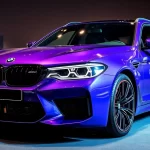 BMW M5 Touring Daytona Violet sorprende en IAA Múnich con kit de carbono y ruedas doradas